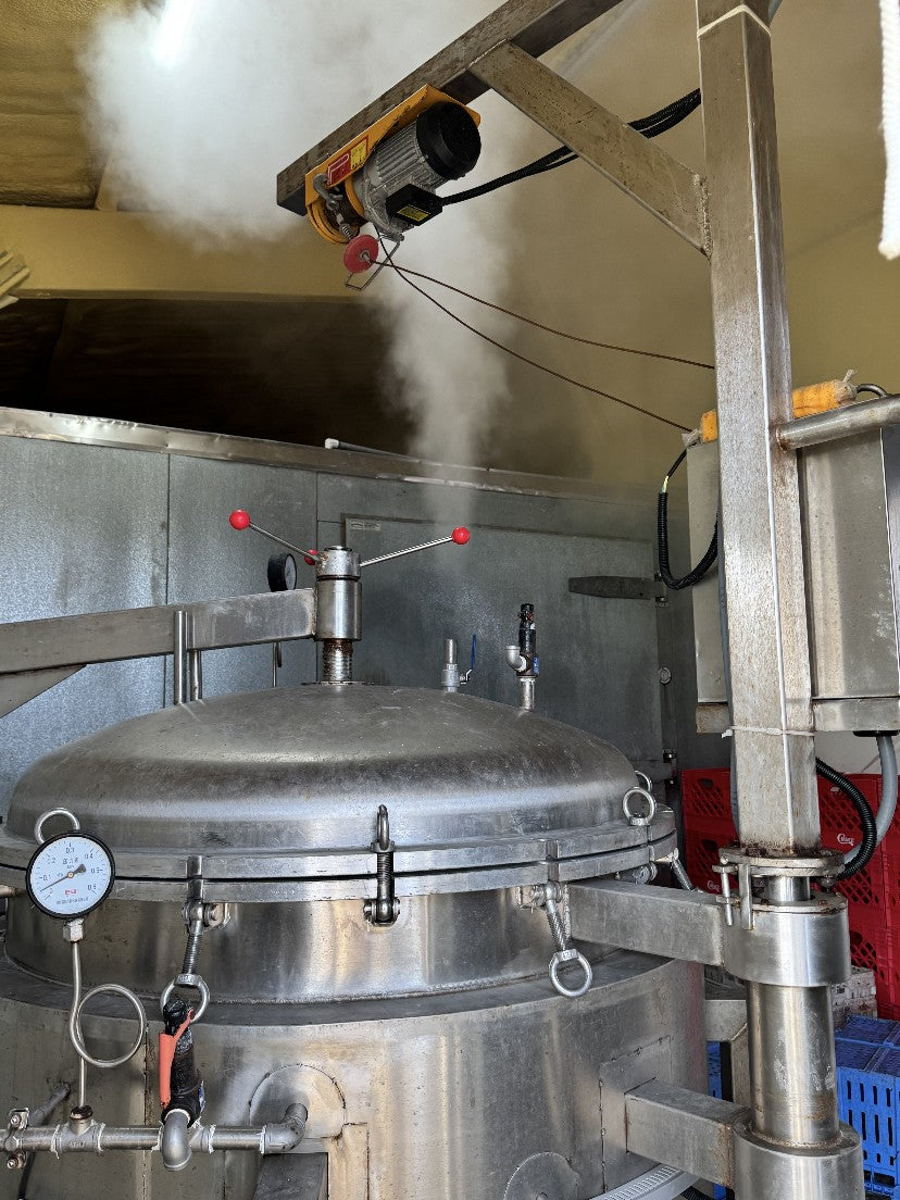 Steam rising from the cooker at the Jab's Seafood plant in Hackberry, Louisiana